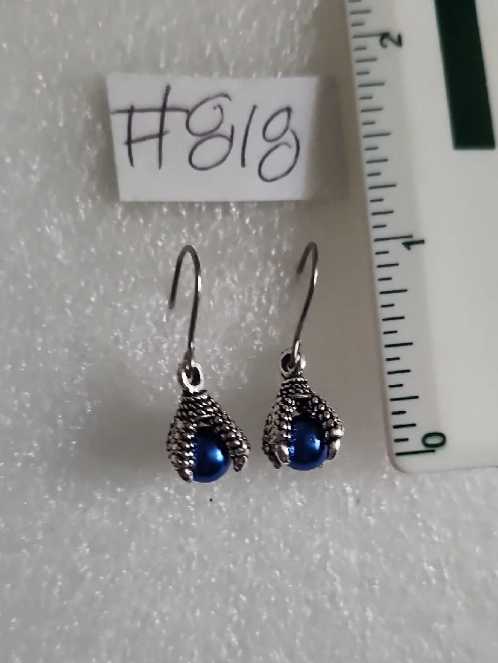 Silver Dragon Claw Drop Earrings with Blue Pearl Accent